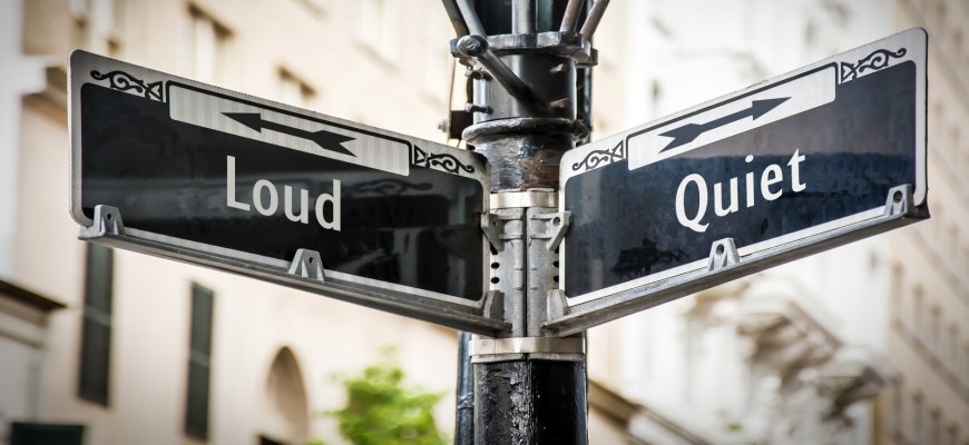 Street sign post with Loud and Quiet street signs